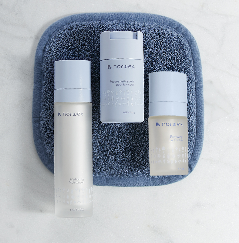 Norwex skin care products on microfiber cloth.