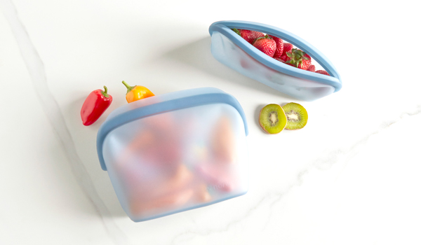 Norwex Reusable Silicone Bags with Peppers and Fruits.